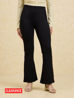 Twenty Dresses by Nykaa Fashion - Black Solid High Waist Fit And Flare Jeggings