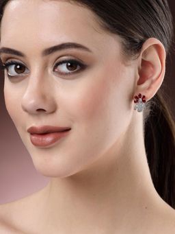 Karatcart - Silver Plated Red Stones Floral Design Ad Stud Earrings for Women