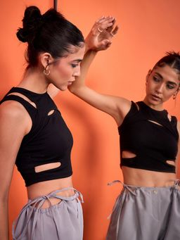 Uptownie - Sleeveless Stretchable Ribbed Crop Top with Front Cut Outs Black