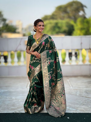 Dark Green Soft Banarasi Silk Saree Featuring Meenakari Zari Weaving & Tassels on Pallu