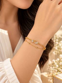 VIRAASI - Gold Plated Austrian Stone Swan Charm Adjustable Chain Bracelet