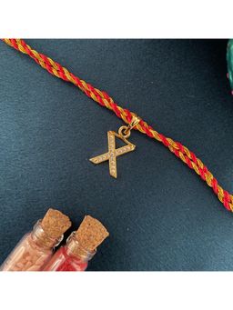 Digital Dress Room - Gold X Letter Ad Red Thread Rakhi