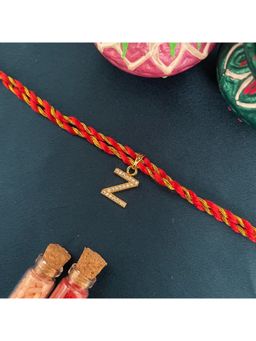 Digital Dress Room - Gold Z Letter Ad Red Thread Rakhi