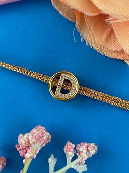 Digital Dress Room - Gold D Letter Round Ad Thread Rakhi