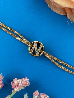 Digital Dress Room - Gold N Letter Round Ad Thread Rakhi