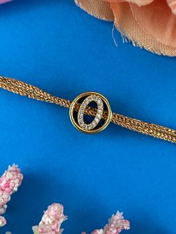 Digital Dress Room - Gold O Letter Round Ad Thread Rakhi