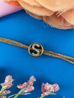 Digital Dress Room - Gold S Letter Round Ad Thread Rakhi