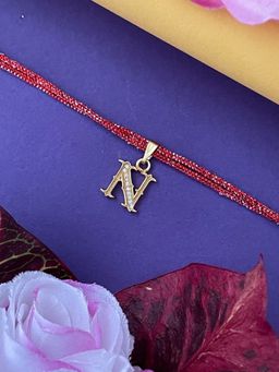 Digital Dress Room - Gold N Letter Ad Maroon Thread Rakhi