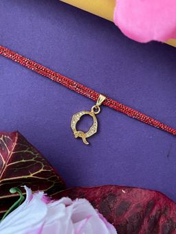 Digital Dress Room - Gold Q Letter Ad Maroon Thread Rakhi