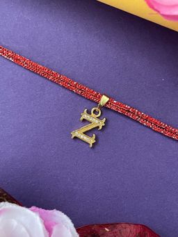 Digital Dress Room - Gold Z Letter Ad Maroon Thread Rakhi