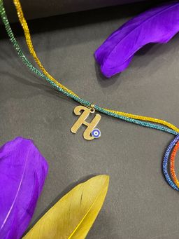 Digital Dress Room - Gold H Letter Evil Eye Thread Rakhi