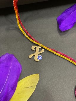 Digital Dress Room - Gold X Letter Evil Eye Thread Rakhi