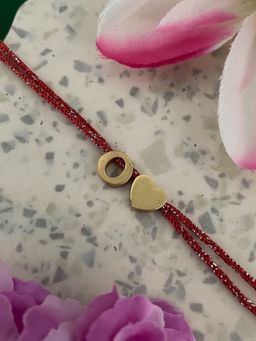 Digital Dress Room - Gold O Letter Heart Charm Thread Rakhi