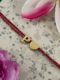 Digital Dress Room - Gold P Letter Heart Charm Thread Rakhi