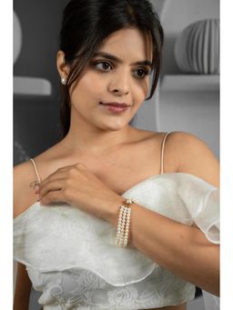 EVAARAZ - Multi Layer Pearl Bracelet