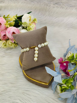 EVAARAZ - Cream Pearl Charm Bracelet