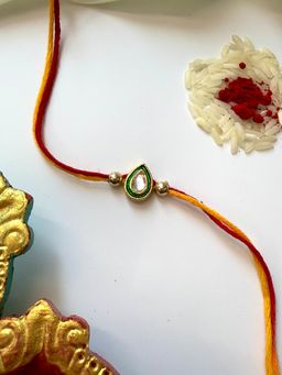 ISHKAARA - Kundan Bead Green Rakhi with Roli Chawal