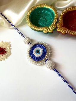 ISHKAARA - Pearl Evil Eye Rakhi with Roli Chawal