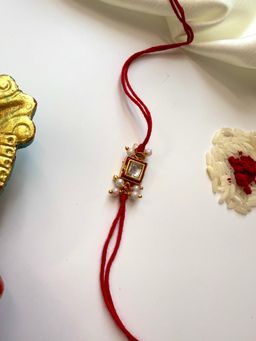 ISHKAARA - Pearl Royal Red Kundan Rakhi with Roli Chawal