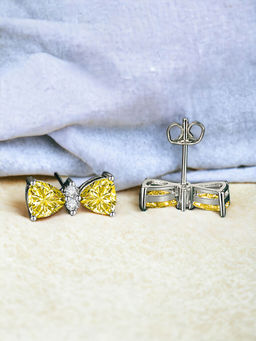 Designs & You - Crushed Ice Cut Cubic Zirconia Silver Plated Yellow Bow Tie Stud Earrings