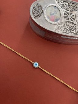 Digital Dress Room - American Diamond Rakhi Round Evil Eye Charm Creamish Yellow Thread Rakhi