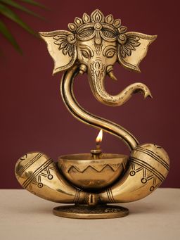DecorTwist - Brass Modern Ganesha Idol With Akhand Diya