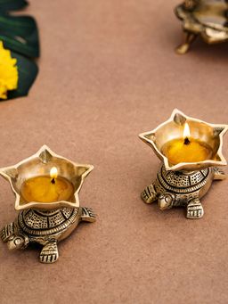 DecorTwist - Brass Tortoise Panchmukhi Diya Set of 2