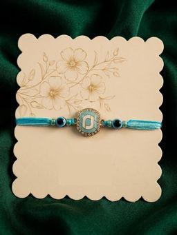 Gahan - Chandan Blue Evil Eye & Artificial Stones Oval Shape Thread Rakhi
