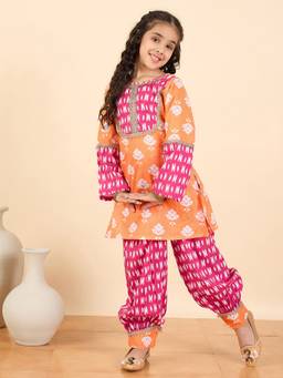 StyloBug - Girls All over Print Ethnic Wear Kurta With Salwar Magenta