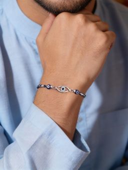 Ornate Jewels - 925 Silver Blue Sapphire Evil Eye Charm Thread Rakhi With Roli Chawal for Brother