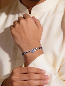 Ornate Jewels - 925 Silver Blue Topaz Evil Eye Protective Thread Rakhi With Roli Chawal for Brother
