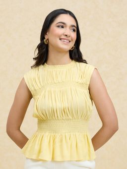 Twenty Dresses by Nykaa Fashion - Yellow Solid Smocked Sleeveless Peplum Top