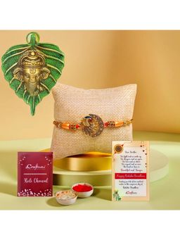 eCraftIndia - Designer Peacock Rakhi for Brother, Ganesha Face On Leaf Wall Hanging