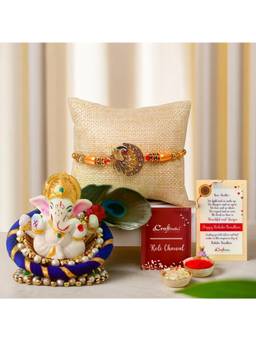 eCraftIndia - Peacock Designer Rakhi for Brother, Lord Ganesha Idol On Floral Plate
