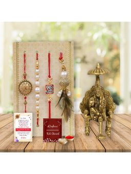 eCraftIndia - Pack Of 4 Floral, Pearls, Diamonds, Lumba Designer Rakhis ,\Sai Baba Idol