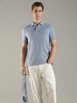 Tommy Hilfiger - Men Blue Solid Regular Fit Cotton Polo T-Shirt
