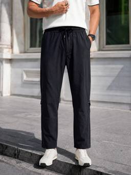 The Indian Garage Co - Men Relaxed Fit Solid Side Pocket Mid-Rise Track pant-Black