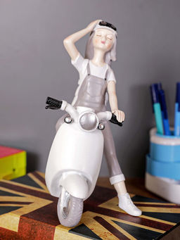 Aarvi Decor - Ceramic White Scooter Chic Girl Figurine