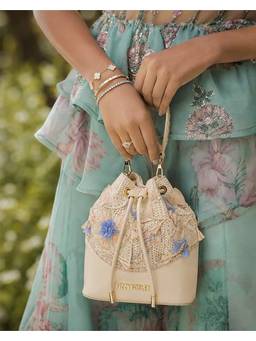 Fizzy Goblet - Ivory Sugar Coated Potli Bag