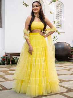 Lavanya The Label - Yellow Net Tiered Flared Lehenga (Set of 3)
