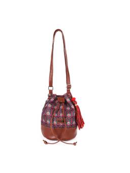 Astrid - Textured Sling Bag For Girls With Tassels Magnetic Closure And Zip Pocket.