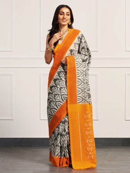 Aditri - Orange Handloom Ikat On Gas Saree with Unstitched Blouse
