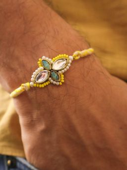 BeAbhika - Yellow Kundan Floral Pearl Rakhi With Roli Chawal Capsules