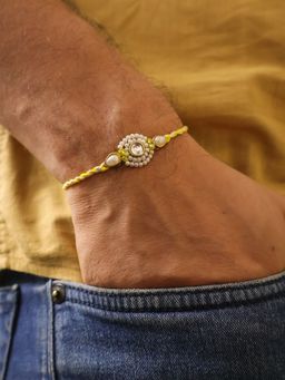 BeAbhika - Pearl Kundan Halo Designer Rakhi With Roli Chawal Capsules
