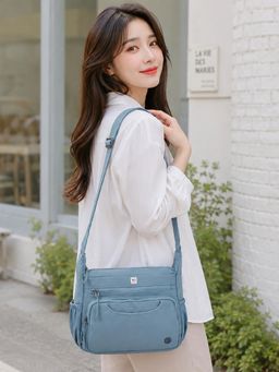NFI Essentials - Multi Pocket Sling Bag for Women Blue