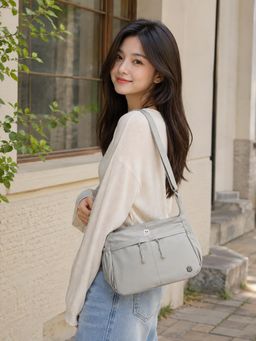 NFI Essentials - Multi Pocket Sling Bag for Women Blue