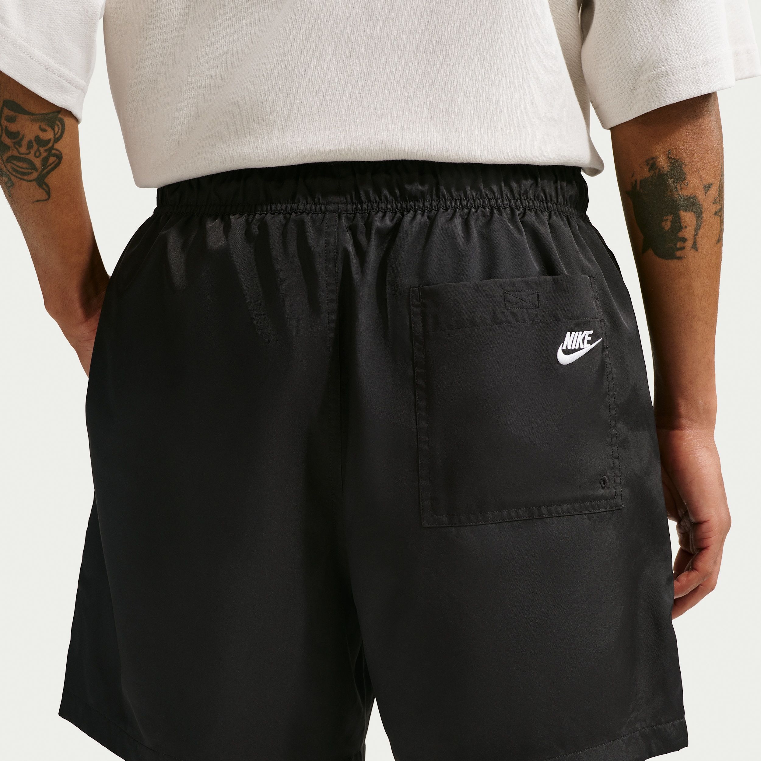 nike sportswear woven flow shorts
