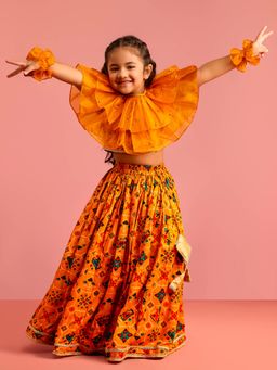 Vastramay - Girls Mustard Printed Lehenga, Choli with Ruffled Hand Gloves