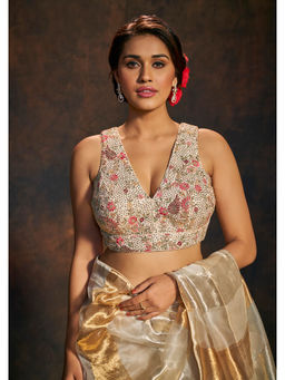 SALWAR STUDIO - Cream Sleeveless Stitched Blouse with Floral Embroidery and Sequin