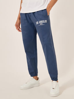 Styli - Men Relaxed Fit Joggers with Placement Print Navy Blue